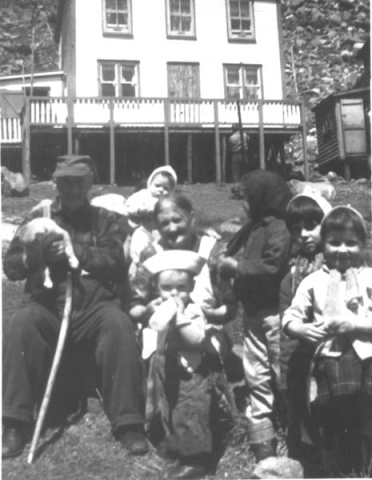 394: l-r Mike Cochrane, his infant grandson Tom Cochrane, his wife Ellen Judge, his grandson Bill Cochrane  in the sailor hat, unidentified person, Julia and Deneise Kerrivan. (1963) [courtesy of Sadie (Norman) Kerrivan]  Mike son of Michael Cochrane &amp;amp; Mary Pomeroy; Ellen daughter of Peter Judge &amp;amp; Bridget Norman;  Tom and Bill sons of Peter Cochrane &amp;amp; Marie Martin;  Julia and Deneise daughters of Joseph Kerrivan &amp;amp; Madeline Bennett